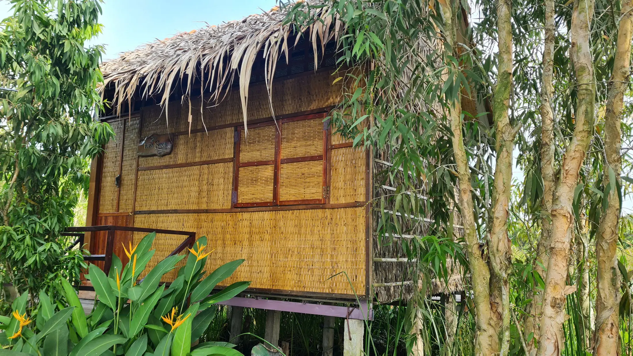 Eco Stilt House exterior woven from natural materials